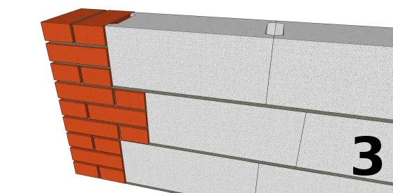 La troisième assise de parpaings avec un pilier de 22 x22 